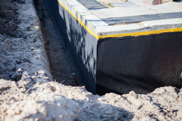 Professional Waterproofing technician working in Harmony, IN